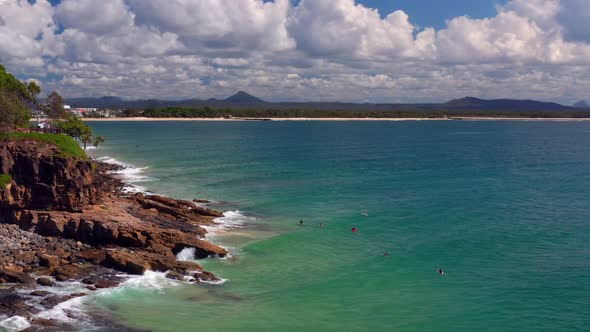 Flying Over Rocky Shoreline Of Noosa National Park With Tourist Near Noosa Heads, QLD Australia. Aer alt