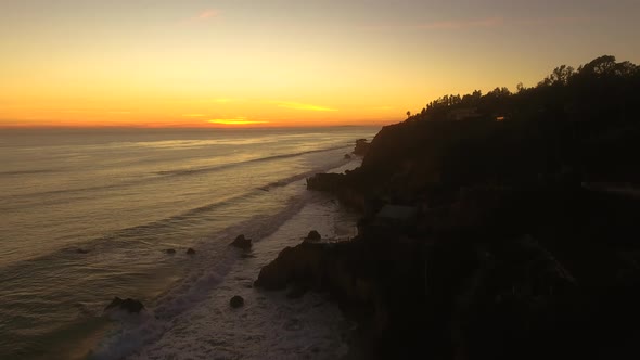 Sunset Deserted Wild El Matador Beach Malibu California Aerial Ocean View - Strong Waves with Rocks
