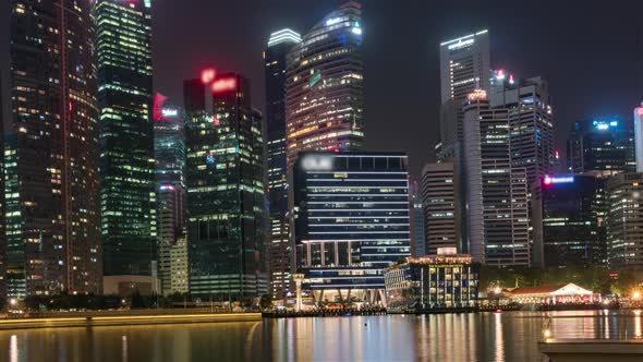 Singapore, Singapore, Hyperlapse - The city skyline at night and its skyscrapers