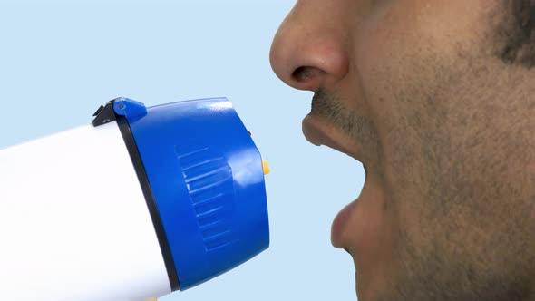 Close Up Man Making Announcement in Megaphone alt