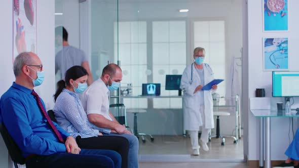 Senior Doctor Giving Bad News alt