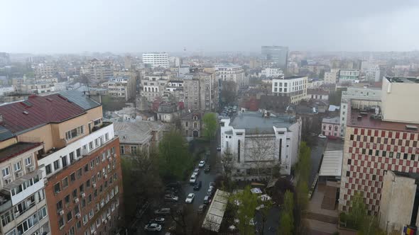 Bucharest Cheerless Cityscape during Rainy Weather, High Angle Static. alt