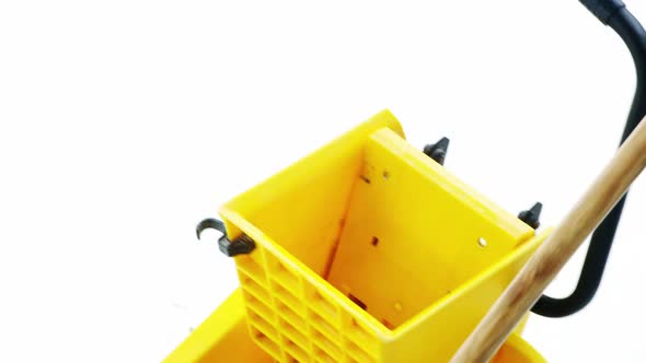 Cleaning floor using a mop alt