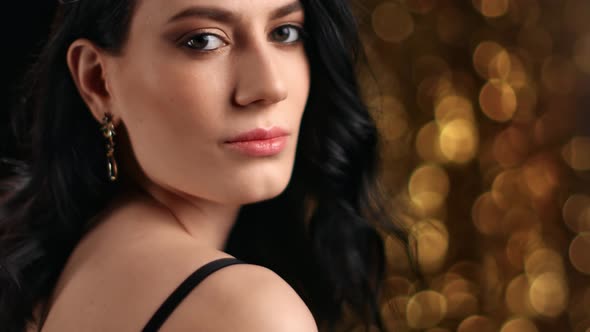 Extreme Close Up Face of Smiling Lady with Natural Beauty in Jewelry Earrings alt