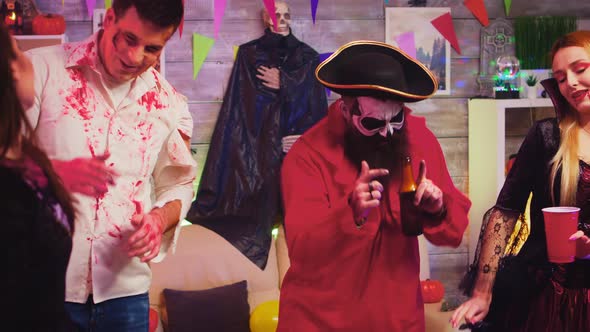 Crazy Halloween Party with Different Funny and Scary Characters Dancing in Decorated Room alt