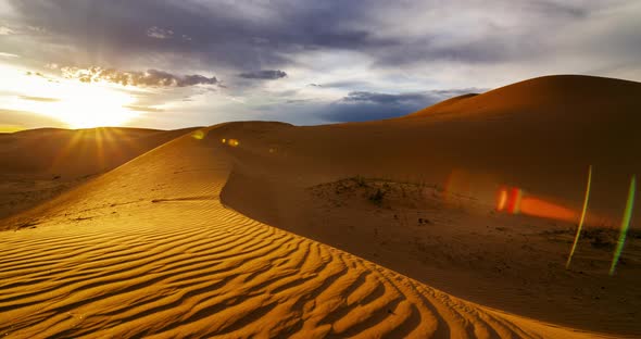 Sunset Over The Sand Dunes In The Desert