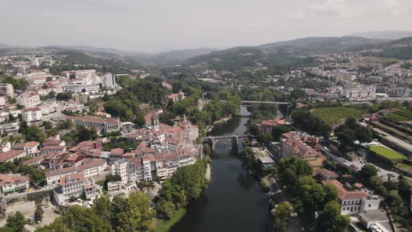 Cityscape of Amarante, Portugal. Tamega River and city riverside aerial view alt