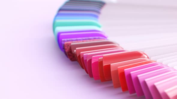 Seamless looping animation of nail polish arranged in a circle. Bright colours. alt