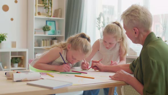 Twin Sisters Drawing with Granny alt