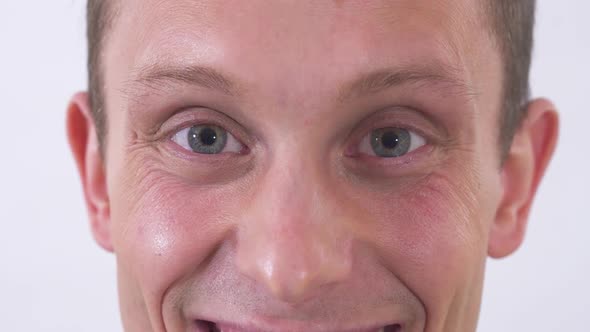 Face of Young Happy Joyful Emotional Man Smiling alt