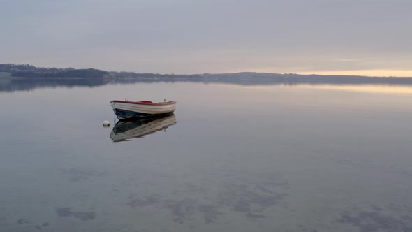 Rowboat on a Sunrise Denmark alt