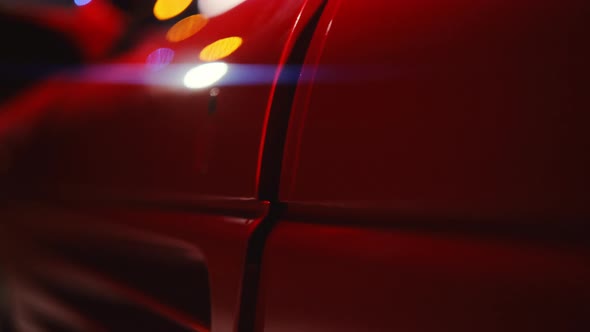 Woman Getting Out Of Red Ferrari 348 TB Parked In Garage alt