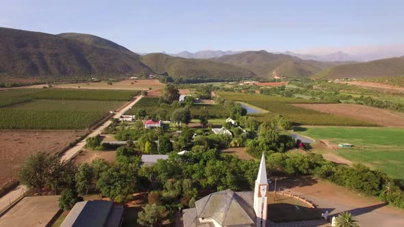 Aerial travel drone view of Oudtshoorn, Western Cape, South Africa. alt