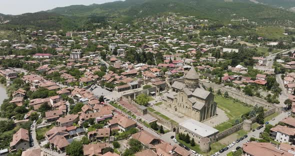 Flying Over Svetitskhoveli Cathedral In The Historic Town Of Mtskheta, Georgia. Aerial Drone Shot alt