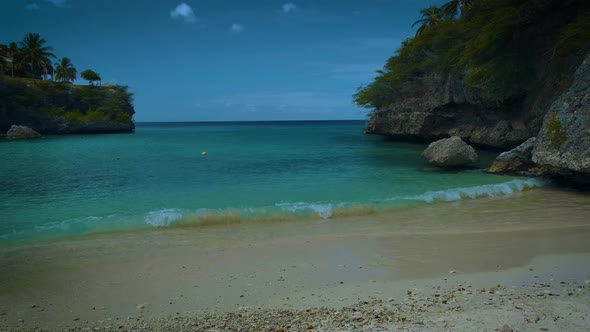 Playa Lagun Beach Cliff Curacao Beautiful Tropical Bay with White Sand and Blue Ocean Curacao alt