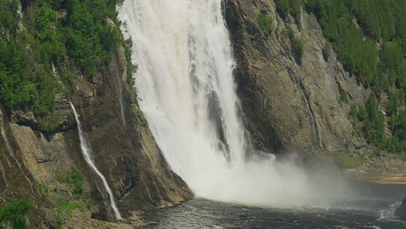 Tilt up of the Montmorency Falls alt