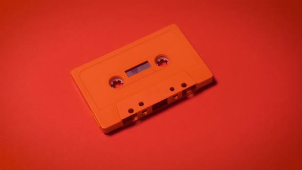 Old Red Cassette Tape on a Minimalist Background, Stock Footage | VideoHive