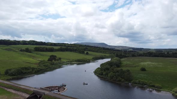 Reservoir Threipmuir With A Lonely Boat On A Water, Balerno, Pentland, Scotland alt