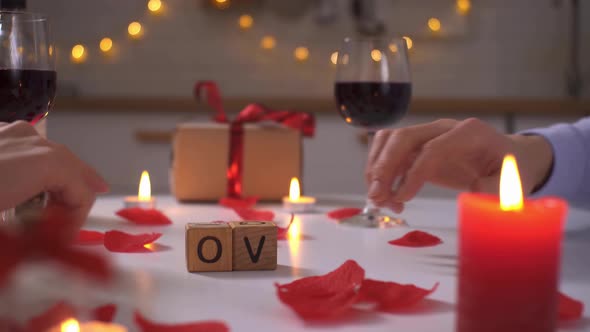 A Couple Of People In Love Move The Letters And Add The Word Love alt