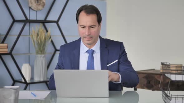 Businessman Leaving Office alt