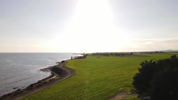 Cyprus green fields. Sea and waves. Fly over beautiful views near Larnaca.