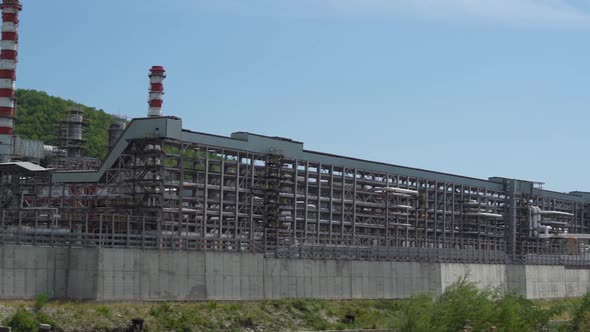 Abandoned Thermal Power Plant with High Color Heater Stacks alt