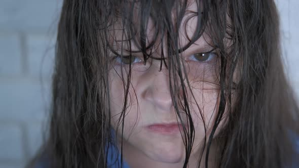 Angry grumpy face.  alt