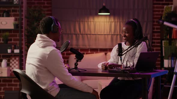 African American Woman Content Creator Recording Podcast with Singer Celebrity alt