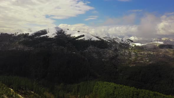 Aerial view Snow capped Mount Kolitza, Natural Mountain range Landscape, Bizkaia. Spain alt