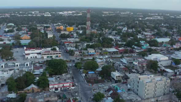 Birds Eye View of Busy City Street with Traffic Jam with Vehicle in the City of Tulum in Mexico alt
