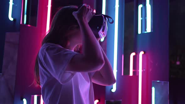 A Woman Put on Virtual Reality Glasses