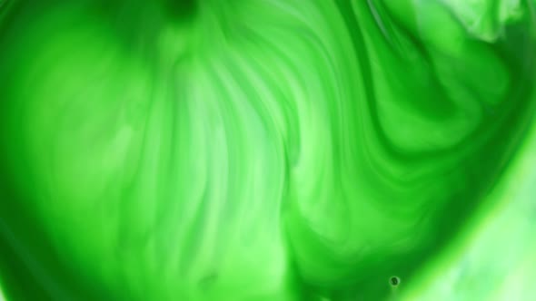  Footage, Ink in Water, Green Ink Reacting in Water Creating Abstract Background