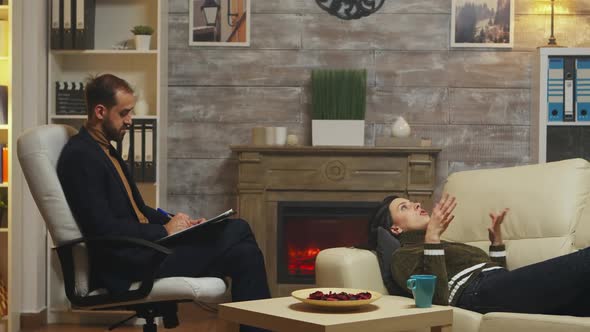 Young Woman Laying on Couch at Couple Therapy alt