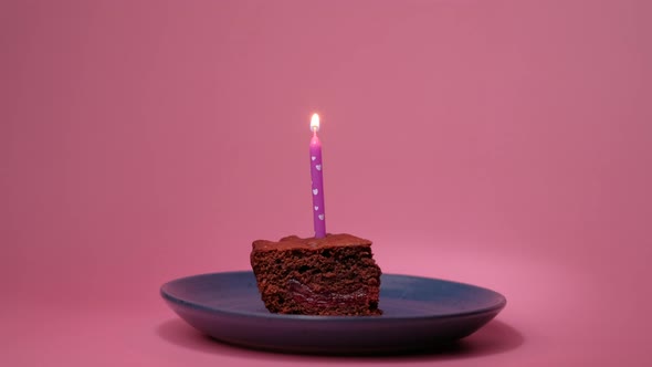 Light a Candle on a Piece of Cake. alt