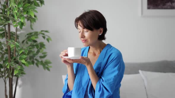 Woman Enjoying Morning Coffee