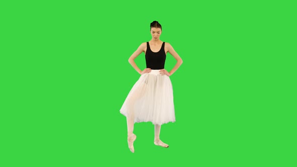 Young Professional Ballerina Making Warmup on a Green Screen Chroma Key alt