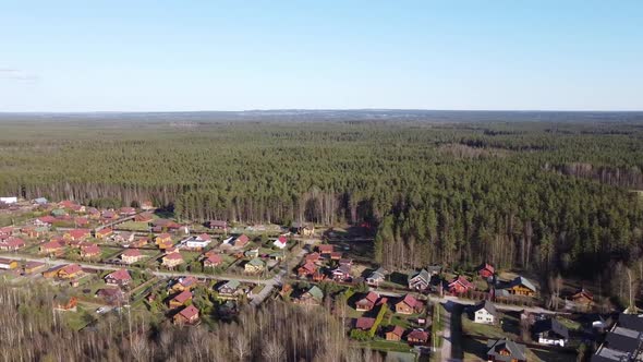 Aerial View of the Lake Borisovskoye, the Forest and the Settlement in Autumn Day, Borisovo