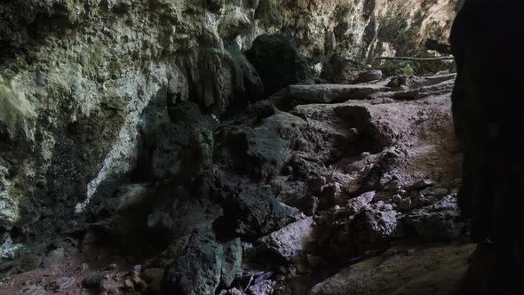 Underground Cave with Stalactite Rock Formations Hanging From Kuza Cave Ceiling alt