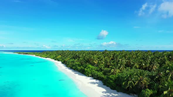 Natural fly over abstract view of a white paradise beach and aqua blue ocean background in 4K alt