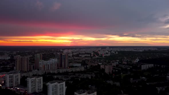 Epic aerial sunset in city residential district