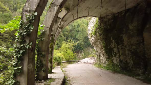 Aerial view from a drone on a road in the mountains. alt