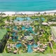 Aerial View of Luxury Resort Hotel on Sunny Summer Holidays with Scenic Seascape - VideoHive Item for Sale
