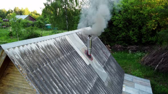 Smoke Comes From the Chimney Stove Heating Woodfired Sauna