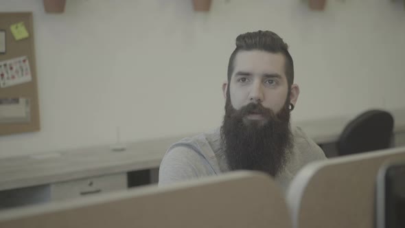 Man talking to person out of frame alt