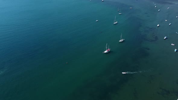 aerial footage boat sails in the sea.