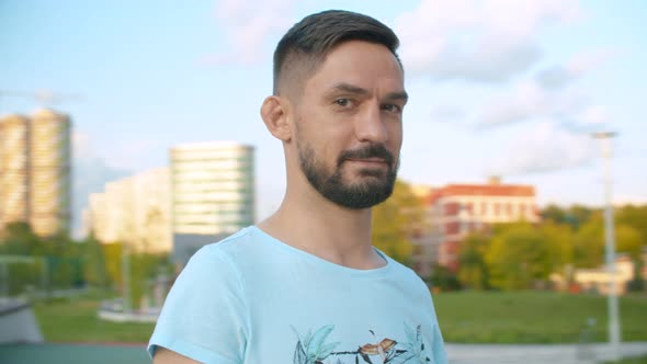 Portrait of a Man While Spinning on Blurred Background