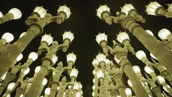 The Urban Light in Los Angeles, at night alt