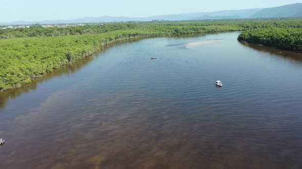 Vibrant riverside scenery at coast city of Itanhaem Sao Paulo Brazil alt