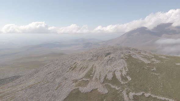 Scenic aerial view of moving white clouds at Abuli Mountain. Georgia alt