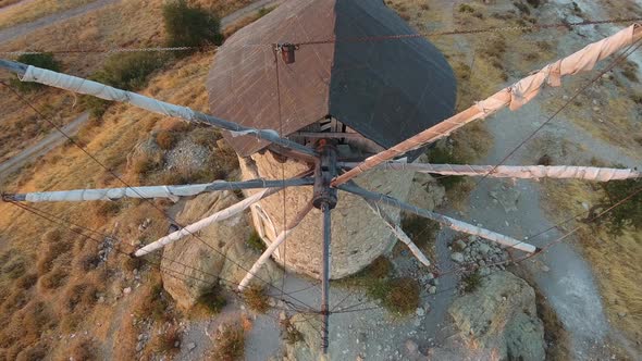 Old Traditional Historic Stone Windmill at the Sunset